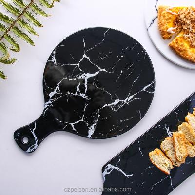 China Custom Viable Black And White Rectangular Round Ceramic Marbled Breakfast Bread Board Pizza Dish With Handle for sale