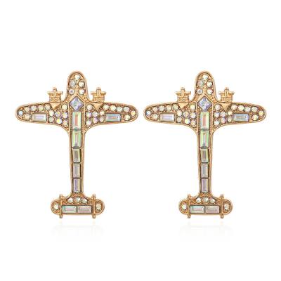 China 2021 CLASSIQUE Retro Airplane Shape Earrings Alloy Gold Plated Diamond Earrings for sale