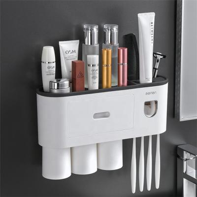 China 2021 Hot Sale Viable Wall Mounted Automatic Toothpaste Dispenser Toothbrush Holder Bathroom Accessories With Three Cups for sale