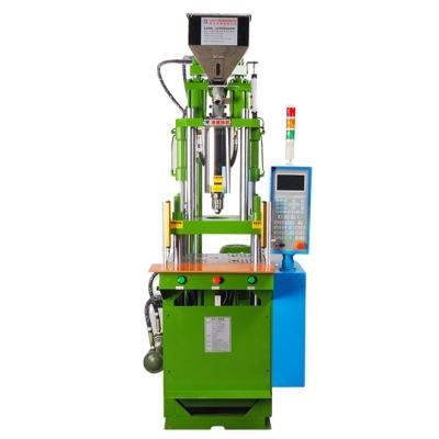 China Plastic vertical injection molding machine for USB making plug LED light making machine Te koop