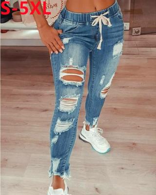 China 2022 new trend viable elastic drawstring jeans for women retro ladies high waist ripped hole street plus size casual women pants for sale