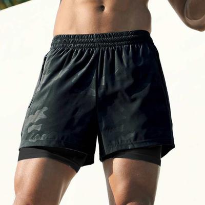 China Double Layer Breathable Sports Summer Quick Dry Breathable Fitness Jogging Athletic Shorts Camouflage Basketball Pants Shorts for sale