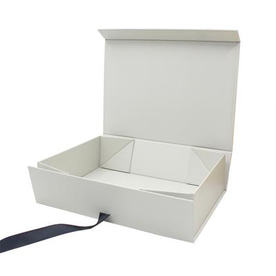 China Recyclable Custom Logo Apparel Packaging Folding Gift Box With Ribbon for sale