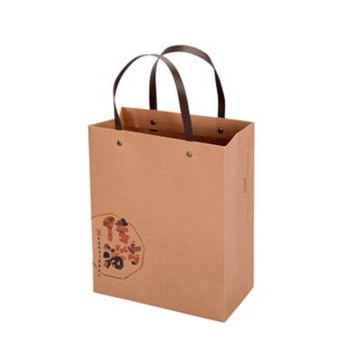 China Custom Logo Moisture Proof Recycled Brown Kraft Paper Bags With Handle for sale