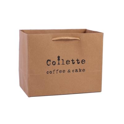 China Moisture Proof Custom Logo Printing Luxury Brown Kraft Paper Bag Clothing With Cotton Rope Handle for sale