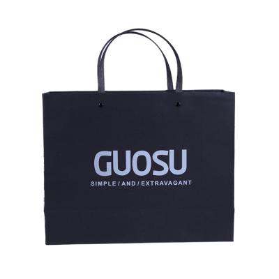 China Moisture-proof durable luxury logo supermarket shopping bag paper black paper bag for restaurant for sale