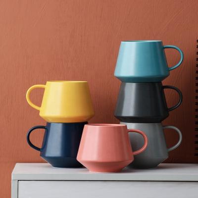 China Viable simple style large capacity ceramic mug orange ceramic mug with handle fashion colorful ceramic coffee mug for sale