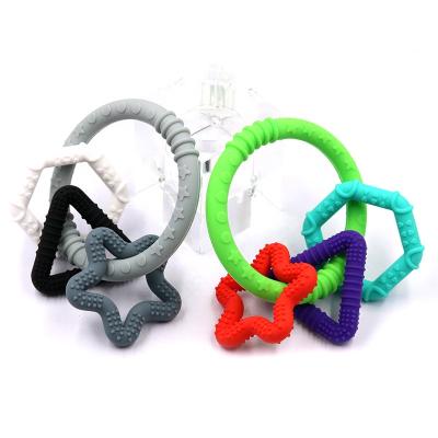 China Latest Design YXT-BT-48 Chewable Personality Geometry Safe And Healthy Teething Silicone Baby Teether Ring for sale