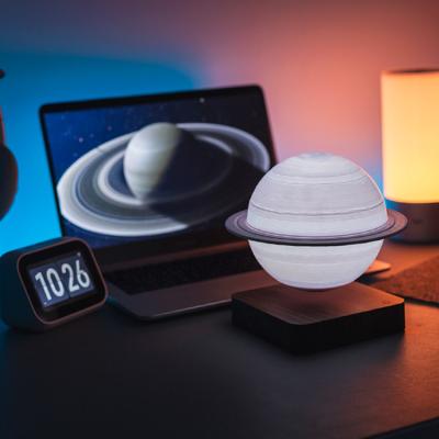 China Nordic Minimalist Creative Luxury Design Living Room Soft Light Magnetic Levitating Saturn Table Floating Lamp for sale