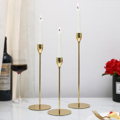 China Luxury Party Home Decoration Set of 3 Gold Metal Candle Holders Wedding Home Decorative Centerpieces for sale