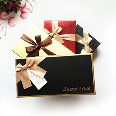 China Recycled Decorative Materials Merry Christmas Matt Black Paper Packaging Gift Box Chocolate for sale