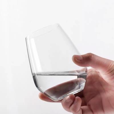 China Modern Wholesale Customized Egg Shaped Stemless Glass Storage Custom White Wine Glasses for sale