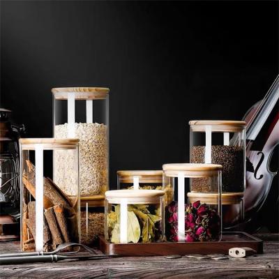 China Modern Suger Airtight Bamboo Glass Storage Jar Food Storage Lid Glass Jar With Lid for sale