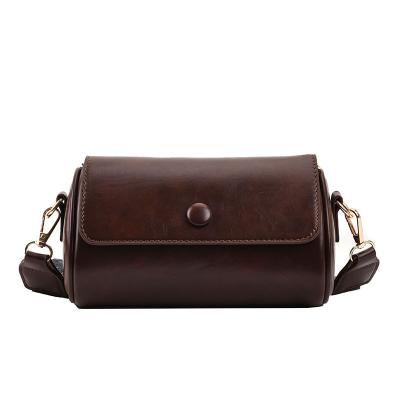 China 2023 fashion bag retro small spring wholesale random wide band single shoulder cross - body cylinder explosive bag for sale