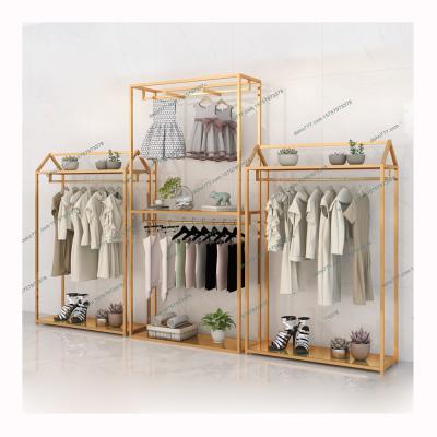 China Shopping Mall Single Sided Wooden Retail Garment Store Shelves Clothing Racks Household Wall Steel Display Rack for sale