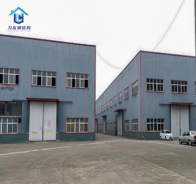 China Industrial Prefab Metal Frame Structure Prefab Warehouse Steel Structure Building For Industry for sale