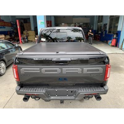 China BESTWYLL Manual Roll Tonneau Cover Waterproof Aluminum Retractable Bedspread Pickup Cover For Ford F150 Raptor 2015-2020 5.8