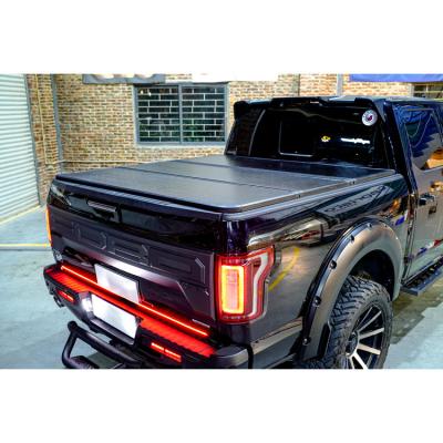 China BESTWYLL AL.Hard Collection Bedspread Waterproof Triple Tonneau Cover For F150/RAM1500-5.5/Tundra-5.5 for sale