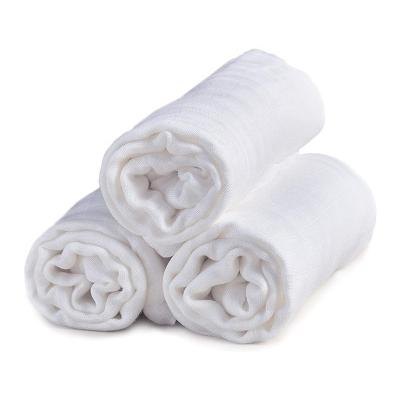 China Multifunctional Pure White Infant Muslin Blanket 2 Layer Organic Cotton Muslin Baby Wrap Covering for sale