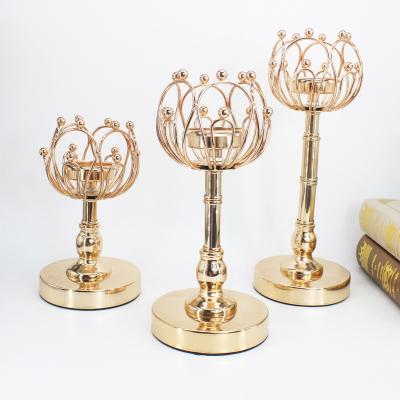 China European Home Decoration Dining Table Centerpieces Flower Shape Candlestick Luxury Gold Metal Pillar Candle Holders for sale