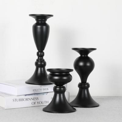 China Amengni Hao Rui Religious Black Candle Holder Activities Amazon Supply Candlestick Border Stand New Retro Paint Wrought Iron Metal Ornaments for sale