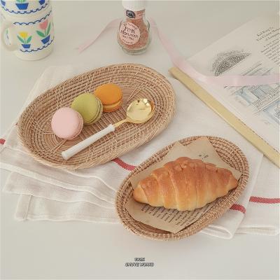 China Sustainable Oval Woven Handmade Wicker Bread Basket Rattan Storage Basket for sale