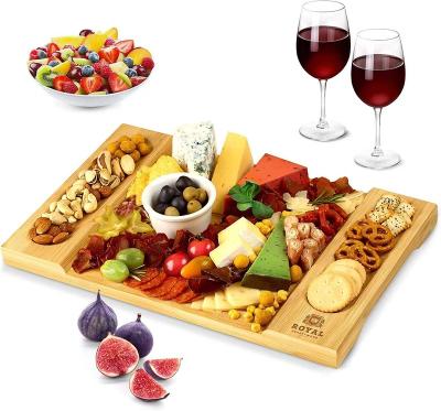 China Sustainable High Quality Bamboo Cheese Cutting Board Kitchen Deli Boards Restaurant Serving Platter Cutlery for sale