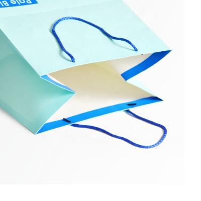 China Custom Materials Logo Luxury Boutique Recycled Blue Shopping Paper Bag With Handle Small Recycled Personal Retail Gift Packaging Paper Bags for sale