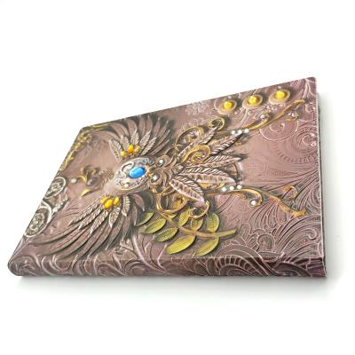 China Handmade Embossed Hardcover 3d Blank Notebook A5 Size Leather Cover Journals for sale