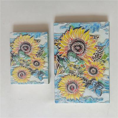 China Custom good quality 3d hardcover japan a5 pu engraved butterfly colorful sunflower private notebook for sale