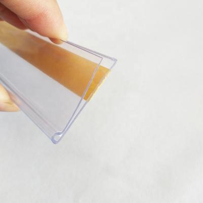 China Supermaerket display clear PVC tape label holder stripwith adhesive supermarket shelf for sale