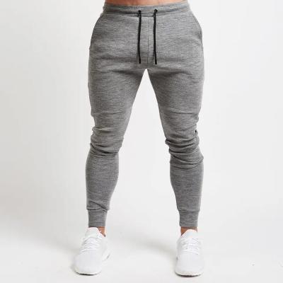 China Anti-Static OEM Streetwear Track Pants Printed Logo Fitted Skinny Cotton Yoga Trouser Running Sports Wear Gym Joggers Custom Mens Sweatpants for sale