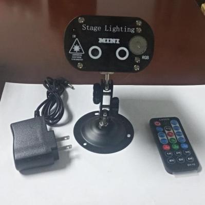 China Hot Selling Amazon RGB Mini Stage Light Karaoke Party Remote Control Remote Control Boredom Led Laser Stage Light for sale