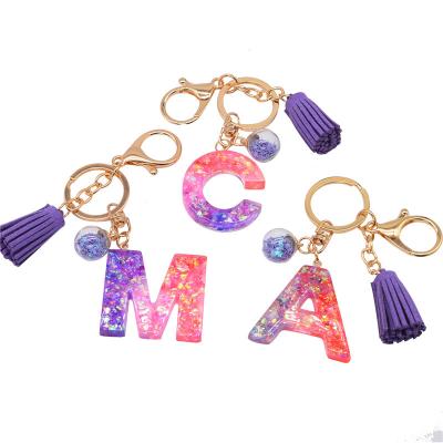 China Christmas Gift Set Wholesale Luxury Design Resin 26 Alphabet Golden Letter Charms Initial Key Chain With Letters Ready To Ship for sale