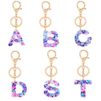 China Christmas Gift Set Wholesale Luxury Design Acrylic Resin 26 Alphabet Golden Letter Charms Initial Key Chain With Letters for sale