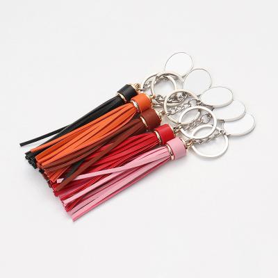 China Luxury Wholesale Custom Colored Blank Photo Leather Film Sublimation Key Chain With Tassel for sale