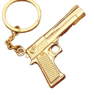 China Pretty Gift T159 Gun Keychain Gold Color Gun Keychain Men's Key Ring Holder Jewelry Souvenirs Gift Hiphop Pendant Models Punks for sale