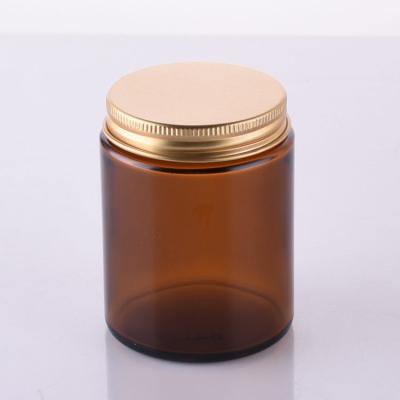 China High Quality Amber Glass Food Safe Food Jars Food Container 150ml Glass Jar Jars With Gold Metal Lids for sale