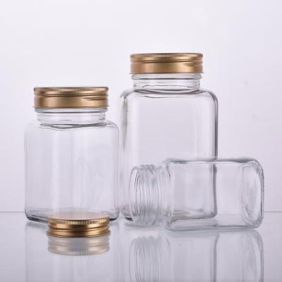 China Domestic Cheap Price Square Food Storage Jars Glass Storage Jar For Honey With Lid for sale