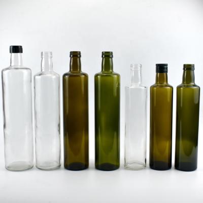 China Food bulk dorica glass oil bottles clear and olive green for frying oil and sauce dressing for sale