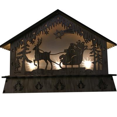 China Eco-friendly Warm White 10L LED Wood Carved Christmas Lights Indoor With Wooden Tree And House Light for sale