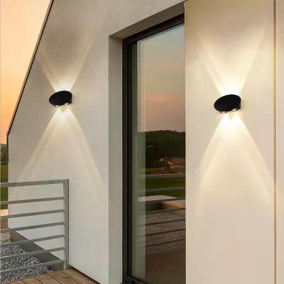 China IP65 3000K Modern Aluminum Exterior Black Color Oval LED Wall Lamp For Home Home Lights for sale