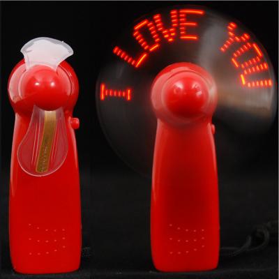 China New Brand World Style Programmable Self Mini LED Fan Custom Glovion Message Light Up Fan Hand Held Promotional LED Programmable Message Fan F for sale