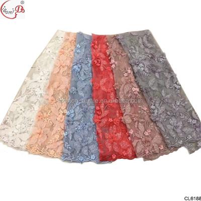 China Grace viable high quality design 3 d flowers beautiful french net lace stones embroidery lace fabric for sale