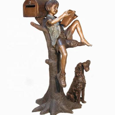 China China Garden Metal Decoration Outdoor Bronze Sculpture Of A Young Boy Reading Next To A Mailbox In A Tree for sale