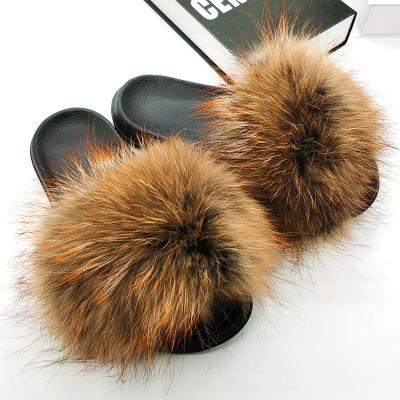 China Damping real raccoon fur slippers latest fashion multicolor soft touch for women fur slippers wholesale fur slides for sale