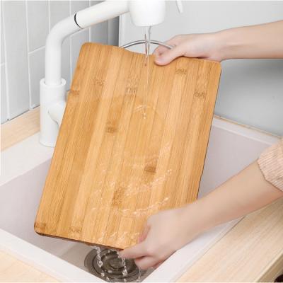 China Hot Sale Stocked Custom Cutting Board , Whole Piece Bamboo Cutting Plate With Handle for sale