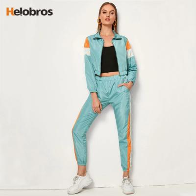 China Custom Anti-UV Your Logo New Arrival Two Piece Set Zipper Sports Women Tracksuit Set- Women's Tracksuit for sale