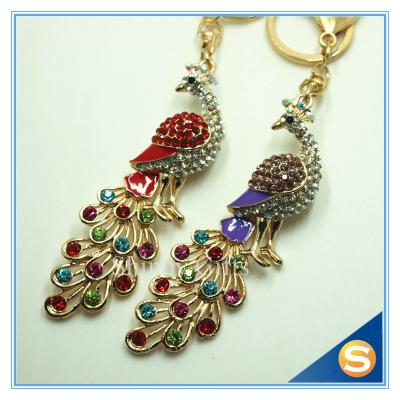 China New Brand Grace Crystal Rhinestone Peacock Metal Keyrings Color Rhinestone Peacock Key Chains for sale