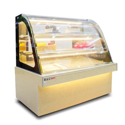 China Single-temperature curved double glass air cooled cake showcase bakery display cabinet for sale